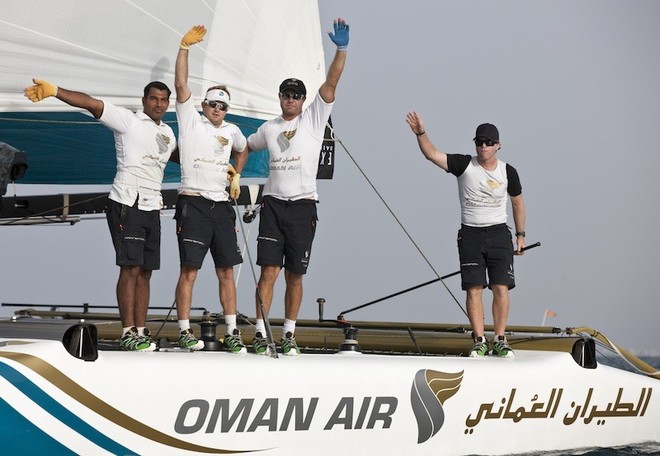 Morgan Larson and crew celebrating winning Act 1 in Muscat - Extreme Sailing Series 2012. Act 1 © Lloyd Images http://lloydimagesgallery.photoshelter.com/